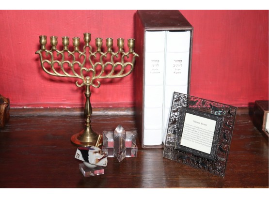 Assortment Of Judaica Items With Brass Menorah, Leather Bound Prayer Books, Mizrah Frame, Dreidel & More