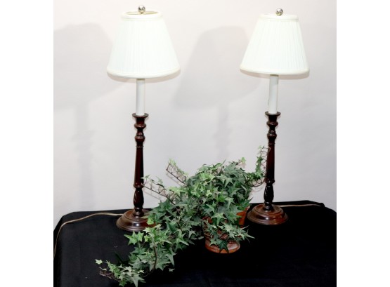 Pair Of Turned Wood Candlestick Lamps That Are Electrified With Pleated Shades & Faux Ivy In Wood Basket Plant