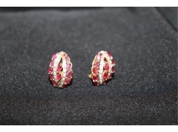 14K YG Pair Of Ruby And Diamond Earrings.