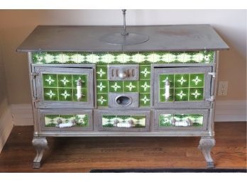 Antique French Enamel Cast Metal Stove With Ornate Design On Porcelain Tiles Stunning Piece