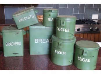 Seven Rustic Green Metal Canisters. 3 Square Or Rectangular Canisters  And 4 Cylinder Canisters