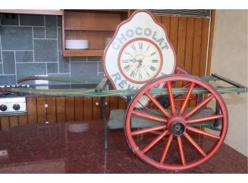 Decorative Pennsylvania Dutch Cart/wagon And Chocolate REVLLON Clock