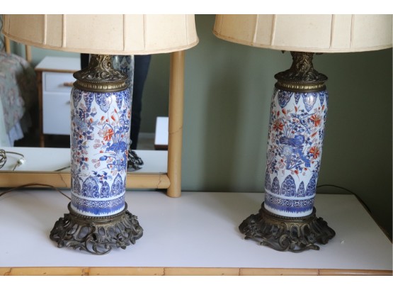 Pair Of Glorious Hand Painted Porcelain Lamps On Bronze Mounts