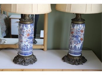 Pair Of Glorious Hand Painted Porcelain Lamps On Bronze Mounts