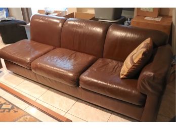 2 Piece Brown Leather Sectional And Coffee Table