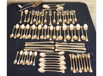Set Of Gold Colored Flatware By International Stainless
