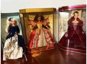 Barbie Dolls Includes Special Edition 1997 Holiday Barbie, 2002 And Avon Exclusive Winter Velvet