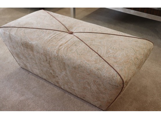 Pretty Custom Upholstered Ottoman With Piping Along The Fabric