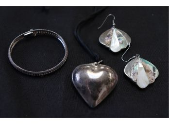Collection Of Sterling Jewelry Includes Large Sterling Heart Pendant On Rope, Bracelet & Pendant