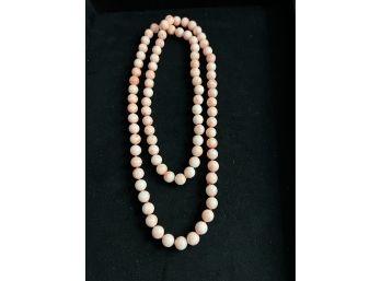 Knotted 35 1/2 Inch Strand Of Pink Coral Beads