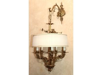 Antique Brass Hanging Wall Sconce With Ornate Decoration
