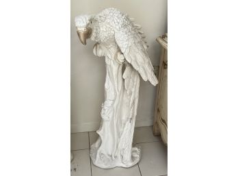 Large Plaster Parrot With Shiny Paint Finish Resting On Tree Stump