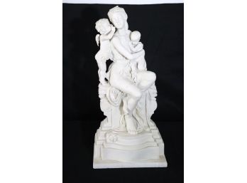 Vintage Looking Resin Carved Statue On White Stone Base