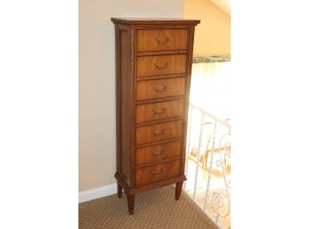 Elegant 7 Drawer Tall Boy Chest With Carved Wood Trim Along The Edges