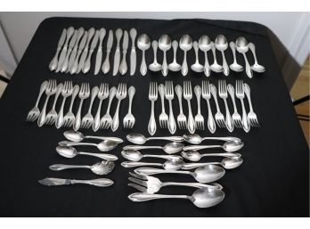 Lot Of Oneida Flatware With Serving Pieces