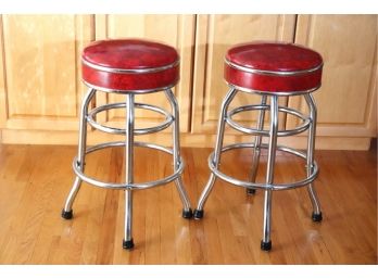 Pair Of 1950s Swivel Counter Stools With Original Red Marbleized Faux Leather Seats By COSCO Made In USA