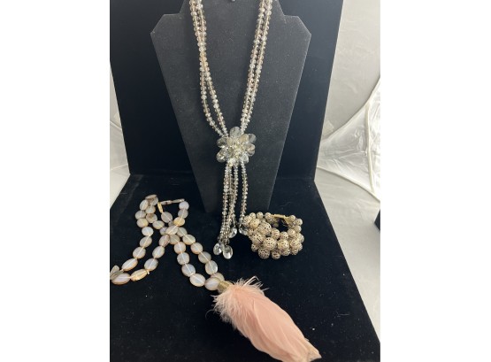 Pretty 2 Strand Crystal Necklace With Elegant Flower Plus Agate Necklace With Pink Feather Pendant.