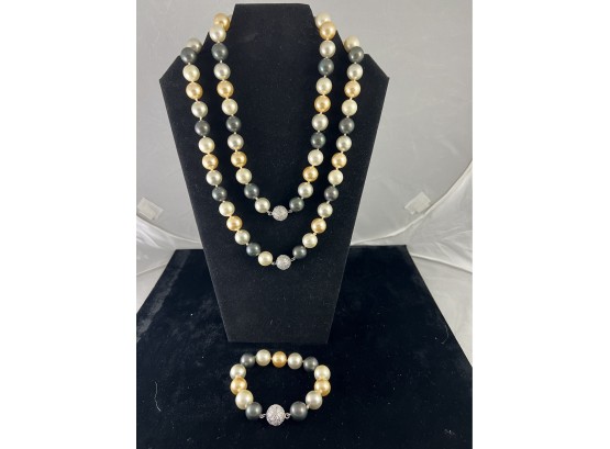 2 Faux Pearl Knotted Necklaces And Matching Bracelet.