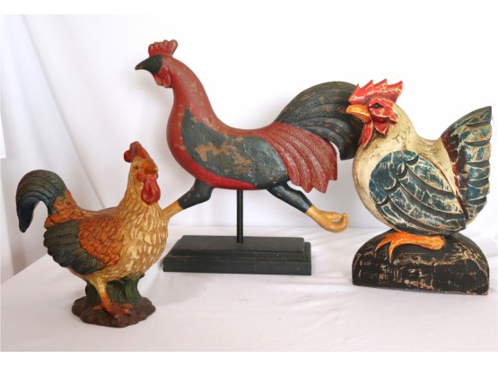 Collection Includes 2 Carved Wood Painted Roosters On A Wood Swivel Stand And A Smaller Ceramic Rooster