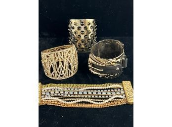 4 Bracelets! Includes Multi Stranded Beaded Bracelet, 2 Metal Cuffs And One Mod Bracelet With Circular Design