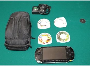 PSP Portable With Games & Case May Be Missing A Wire As Pictured.