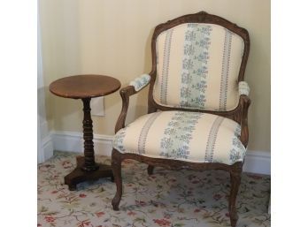 Highly Carved French Country Style Arm Chair With Floral Stitched Upholstery & Side Table With Turned Pedestal