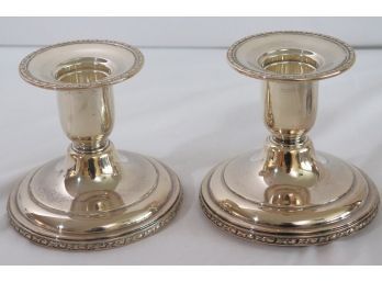 Pair Of Weighted Sterling Silver Candlesticks