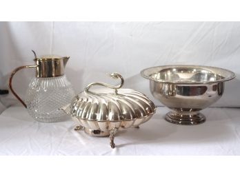 Assortment Of Silver-Plated Items With Large Oneida Bowl, Glass Pitcher & Swan Serving Piece