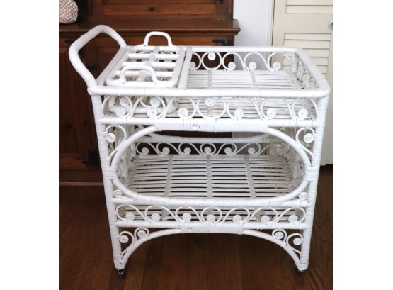 White Wicker Bar Cart With Curlicue Design On Casters