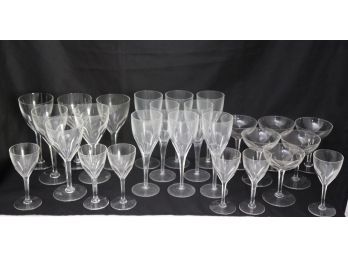 Large Set Of Handsome Assorted Crystal Glasses With Thumbprint Design
