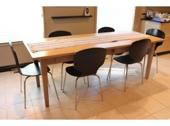 Cool Dining Room Table With 6 Sleek Black Chairs.