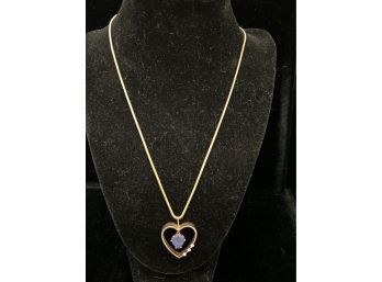 14k YG Tanzanite Heart Inside Gold Heart Pendant On 18' Rope Necklace