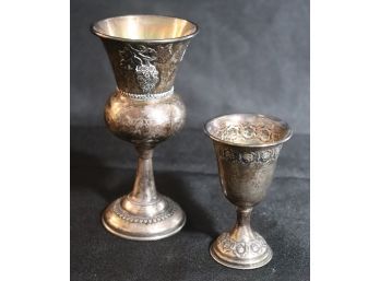 2 Sterling Silver Kiddush Cups With Embossed Floral Detail & Grape Cluster Design.