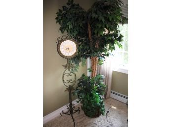 Decorative Metal Clock Decor On Ornate Metal Stand With Rustic Patinated Finish Includes A Faux Tree