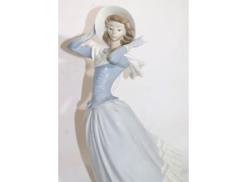 Lladro Figurine Of Girl Holding Hat Spring Breeze, Glazed