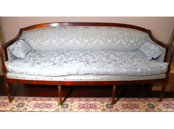 Stunning Settee With A Flame Mahogany Like Finish, Turned Carved Legs, On Casters, May Need New Upholstery
