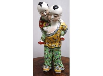 Circa 1930s Pair Of Boys In Piggy Back Position, Bright Colors With Floral Design, Hand Applied Enamel