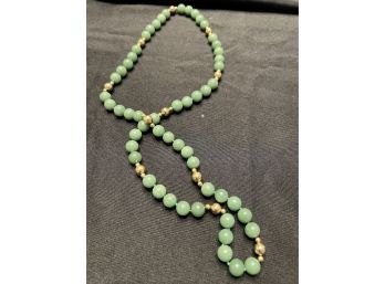 28' Beaded Necklace With Green Knotted Beads And 22 Small Gold Beads And 11 Larger Gold Beads