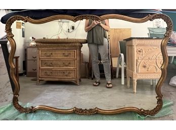 Hollywood Regency Style Mirror With Sensuously Curved Gilt Frame