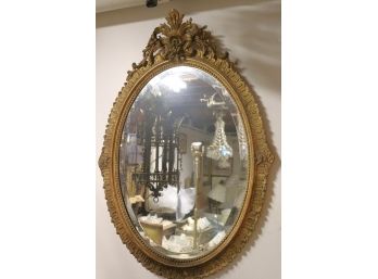 Unique Oval Mirror With Louis XV Style Gilt Frame With Floral Crown