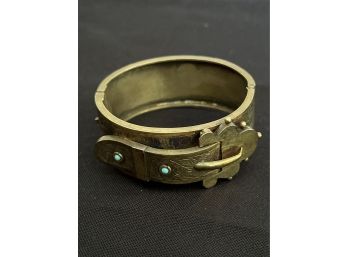 BRASS TONE HINGED FLORAL CUFF BRACELET WITH BELT BUCKLE DESIGN AND TURQUOISE BEADS