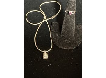 Sterling Silver Pendant And 16' Sterling Silver Chain.