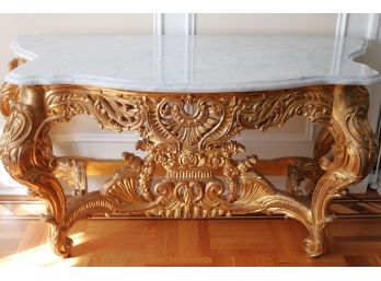 Elaborately Carved Gilded Louis 15th Style With Beveled Marble Top.