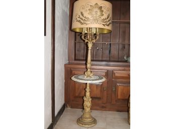 Floor Lamp With A Marble Center And Cherub Accents.