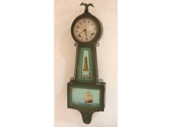 Decorative Lighthouse Wall Clock By Sessions With Eagle Mount On Top