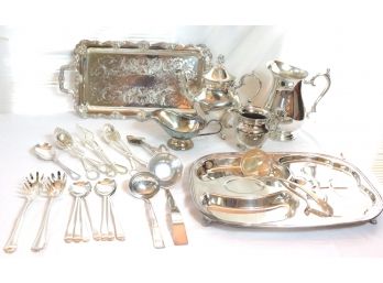 Large Lot Of Assorted Silver Plate Includes Kettle, Serving Trays, And More