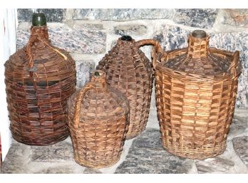 Collection Of Vintage Wicker Wrapped Wine Jugs With Glass Bottles