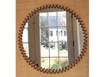 Stylish Wall Mirror Encased In A Metal Frame