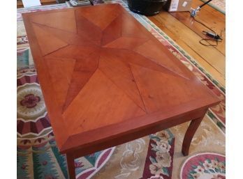 Wood Coffee Table With A Starburst Parquet Style Top, Includes A Drawer On The Side For Storage