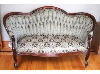 .Vintage Victorian Style Curved Loveseat With Damask Upholstery And Tufted Back